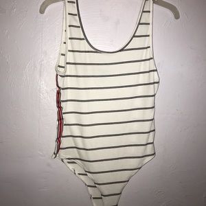 Black,red and white body suit !